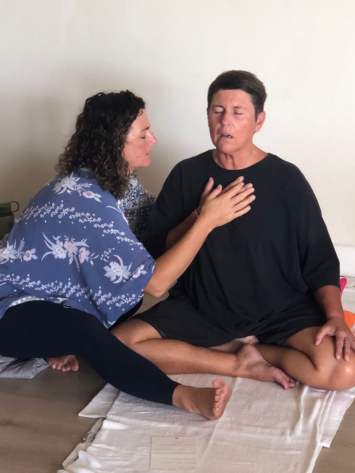 Hridaya supporting a client in session
